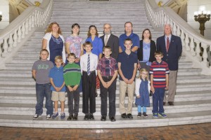 Students and their families with the Salt and Light Homeschool Support Group posed for a picture on the steps in  the Capitol Rotunda during their visit to Harrisburg. 