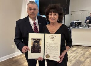 Darlene Glynn being presented with Senate Citation